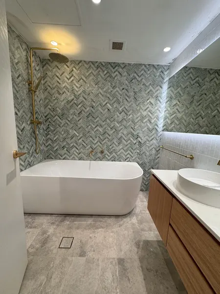 Green herringbone bathroom